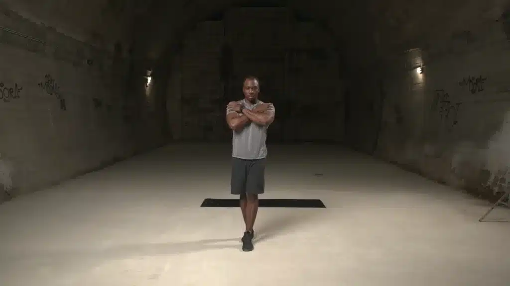 Balance Arms Crossed 0-13 screenshot black man doing strength training