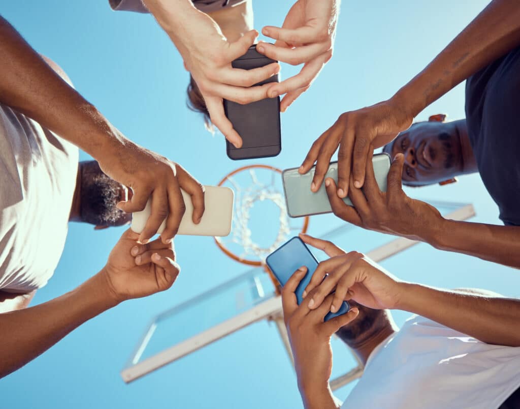 men-in-a-circle-with-phones-networking-on-social-m-2023-11-27-04-52-06-utc