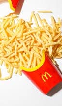 Snack Traps: How Mindless Munching Sabotages Your Diet Mcdonalds Fries on White Surface