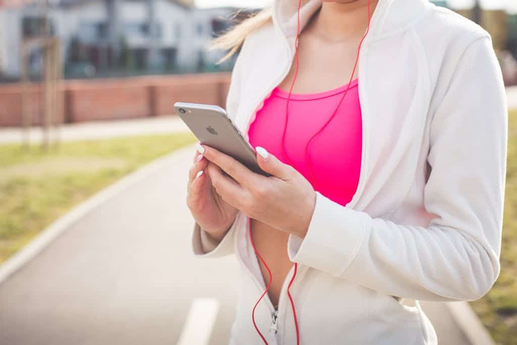 How to workout the right way: From Preparations to Recovery Woman in White Jacket Holding Silver Iphone