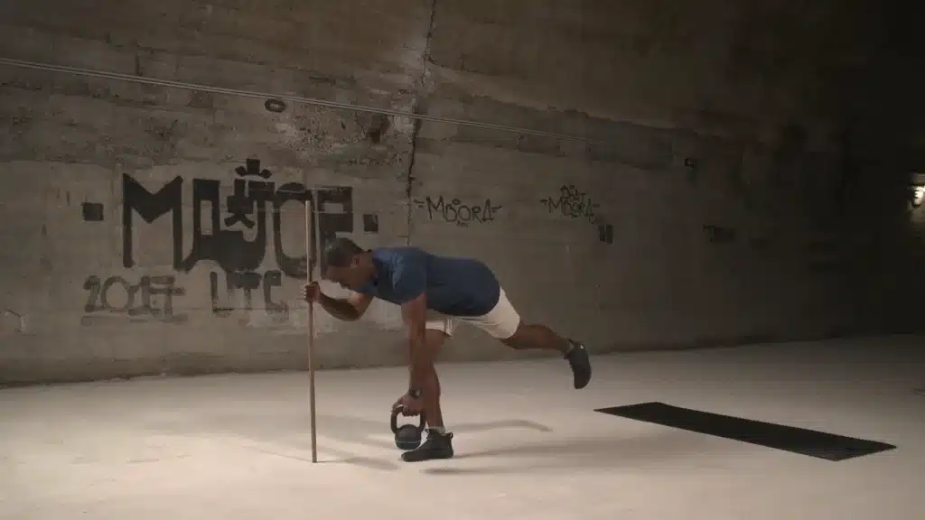 Single-Leg-Romanian-Deadlift-With-Kettlebell-0-50-screenshot-1 black man doing single leg deadlift