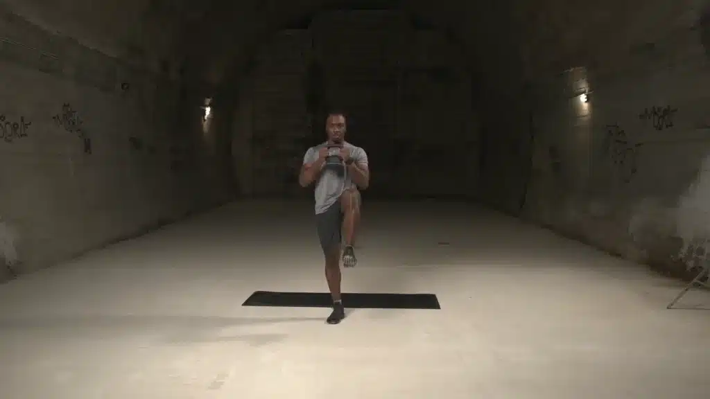 Front Rack Walking With Kettlebell 0-13 screenshot black man doing lunges
