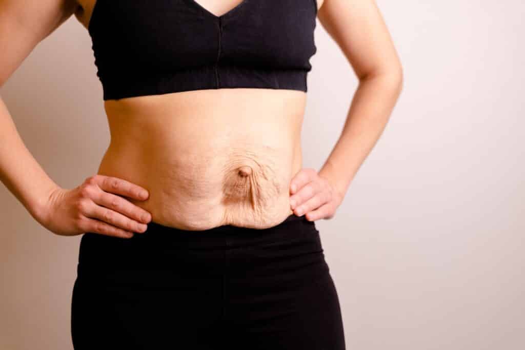 cropped-woman-dressed-in-black-top-and-black-leggi-2023-11-27-04-58-07-utc-1