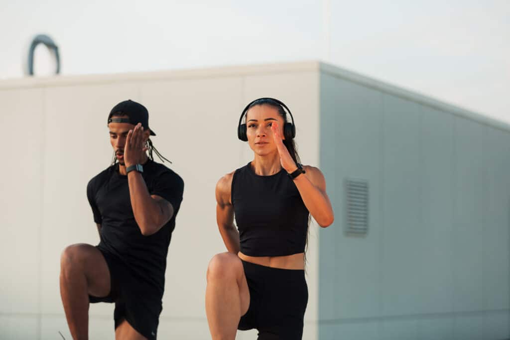man and woman doing HIIT together