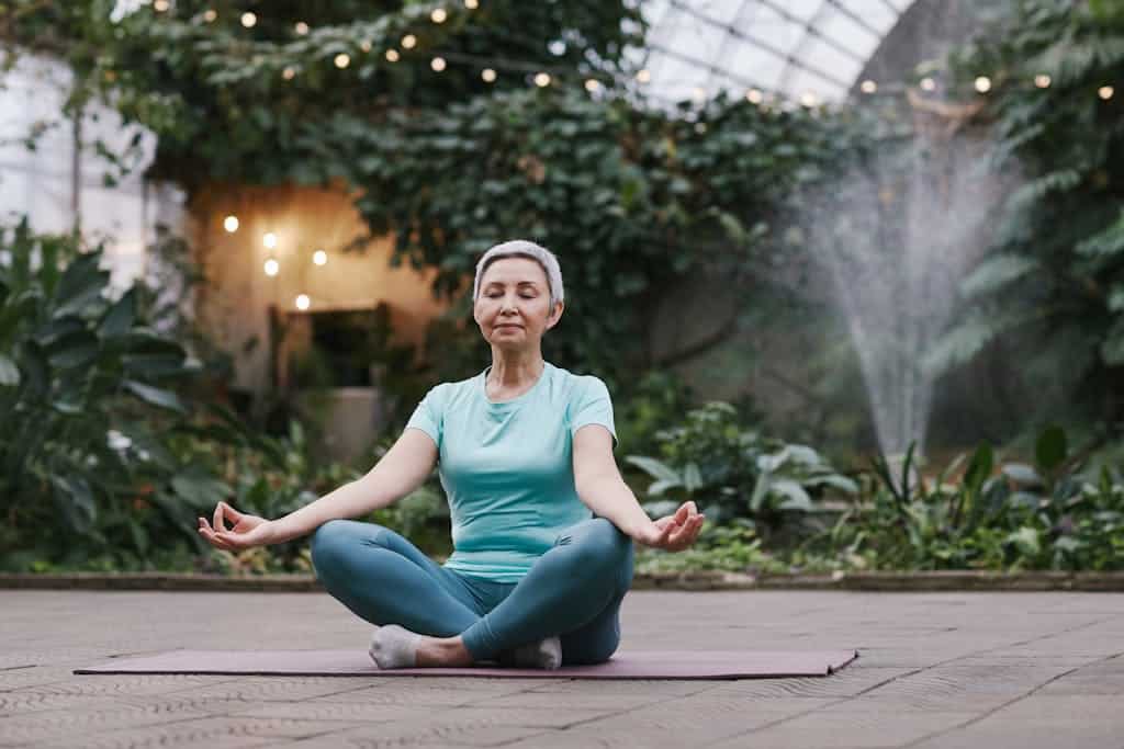 old woman meditating
