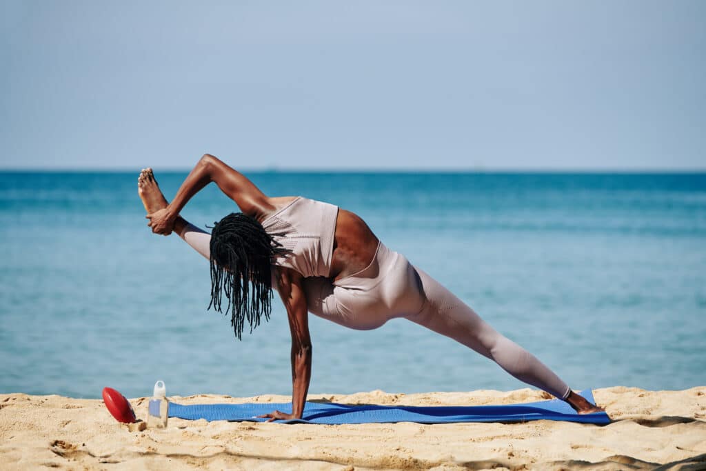 Woman doing Visvamitrasana