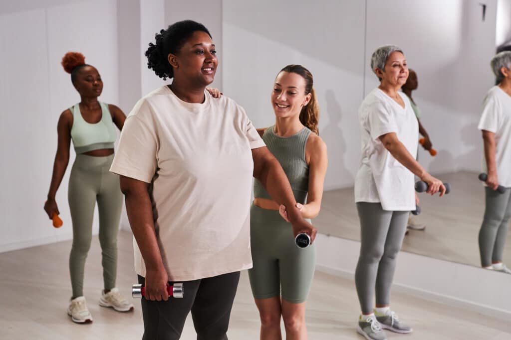Instructor training people in health club