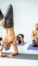 a group of people doing yoga